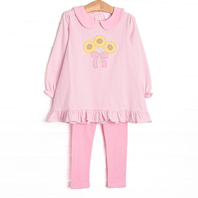This set features pink striped knit fabric, sunflower applique, a pink Peter Pan collar, and long sleeves. Coordinating pink leggings to match.