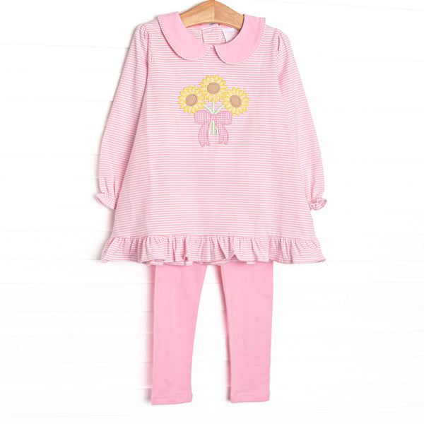 This set features pink striped knit fabric, sunflower applique, a pink Peter Pan collar, and long sleeves. Coordinating pink leggings to match.