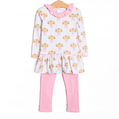 This set features a sunflower print, a pink ruffle neck, and long sleeves. Coordinating pink leggings to match.