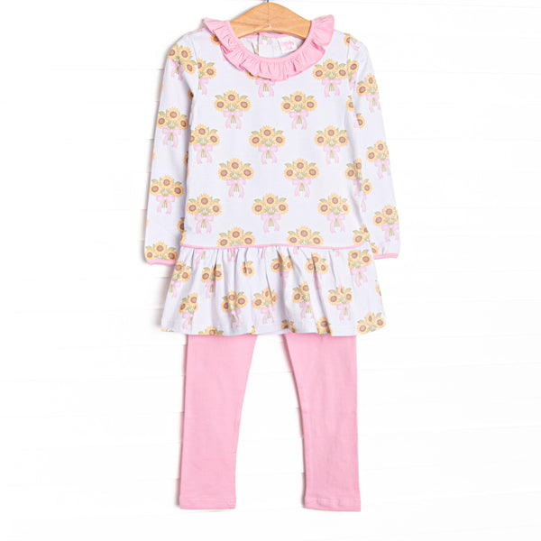 This set features a sunflower print, a pink ruffle neck, and long sleeves. Coordinating pink leggings to match.