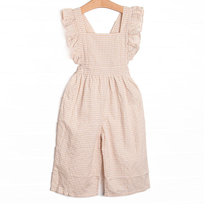 This romper features tan gingham fabric, flutter sleeves, and a criss-cross back.