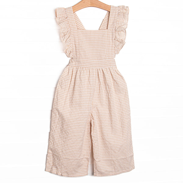 This romper features tan gingham fabric, flutter sleeves, and a criss-cross back.