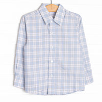 This top features a blue and tan plaid print,&nbsp;polo collar, and buttons.