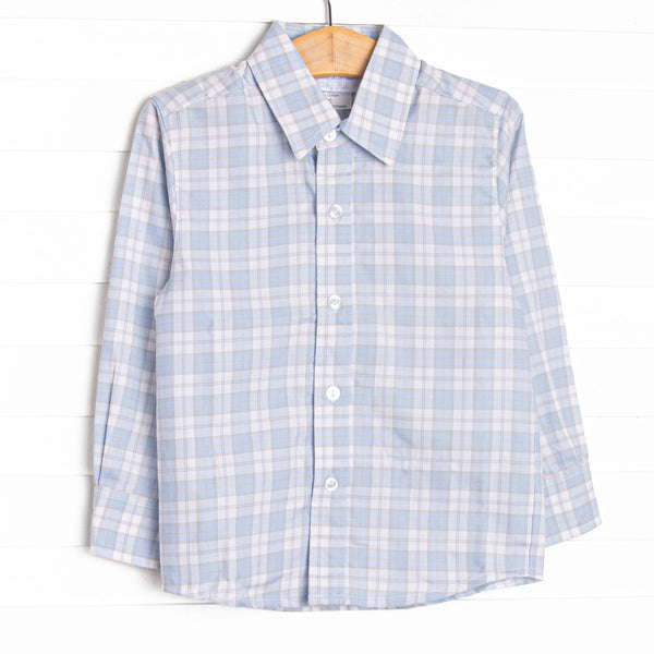 This top features a blue and tan plaid print,&nbsp;polo collar, and buttons.