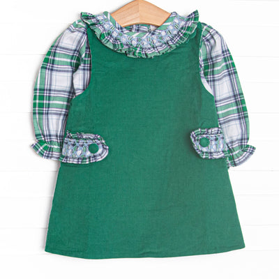 This dress set&nbsp; features a blue plaid top with a ruffle collar and a green corduroy jumper dress with ruffle button-on tabs.