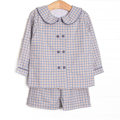 This set features navy and tan plaid, matching shorts, and front buttons.