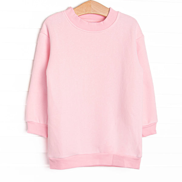 This sweatshirt features a pink fleece fabric, a mock neck, and pink trim.