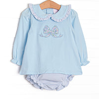 This set features a blue knit top, a floral bow applique and a blue ruffle Peter Pan collar. Coordinating blue striped diaper cover to match