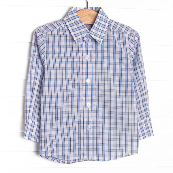 This top features a navy blue and light blue&nbsp; plaid print,&nbsp;polo collar, and buttons.
