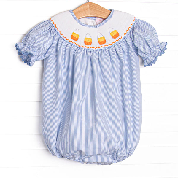  This bubble features blue striped fabric, candy cane smocking, and short puff sleeves. 