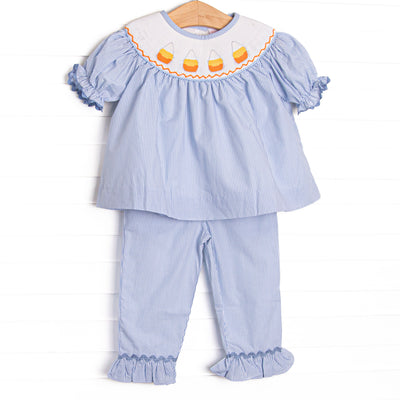 This set features blue striped fabric, candy cane smocking, and short puff sleeves. Coordinating ruffle pants to match.
