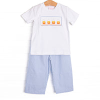 This set features a white top, candy cane smocking, and short sleeves. Coordinating blue striped pants to match.
