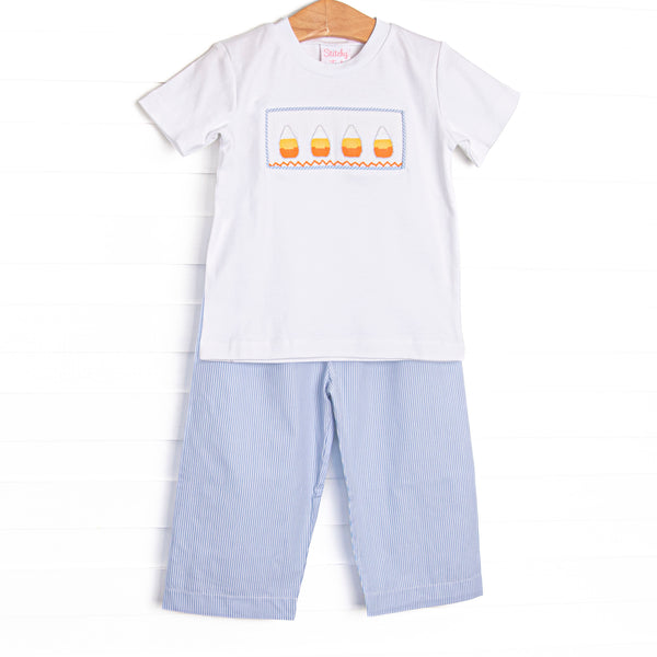 This set features a white top, candy cane smocking, and short sleeves. Coordinating blue striped pants to match.