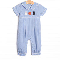 This romper features a blue gingham fabric, Halloween embroidery, and a Peter Pan collar