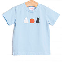  This top features a blue knit fabric, Halloween embroidery, and short sleeves. 