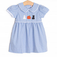 This dress features blue gingham fabric, Halloween embroidery, and ric rac trimmed Peter Pan collar.