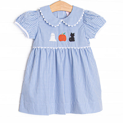 This dress features blue gingham fabric, Halloween embroidery, and ric rac trimmed Peter Pan collar.