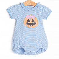 This bubble features blue striped knit fabric, jack-o'-lantern applique, and short puff sleeves.
