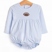  This&nbsp;bubble&nbsp;features a blue striped print,&nbsp;a football embroidery, and snaps on the stride. 