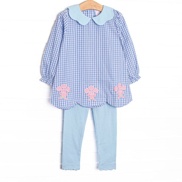 This set features blue gingham fabric, a scalloped collar, and rose applique. Coordinating blue leggings to match.