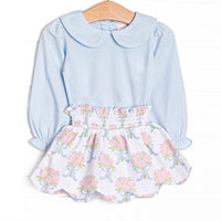 This set features blue knit fabric, pink rose print, and a white Peter Pan collar. Coordinating skirt to match.