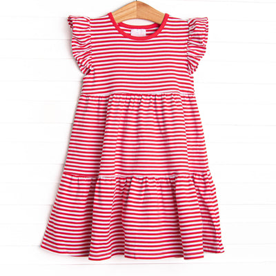 The dress features a precious flutter sleeve, sweet red stripes, and soft knit material.