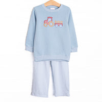  This set features blue knit fabric, tractor applique, and long sleeves. Coordinating blue pants to match. 