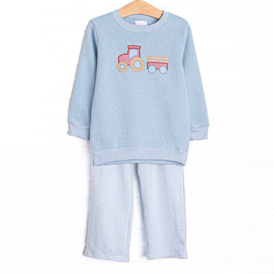  This set features blue knit fabric, tractor applique, and long sleeves. Coordinating blue pants to match. 