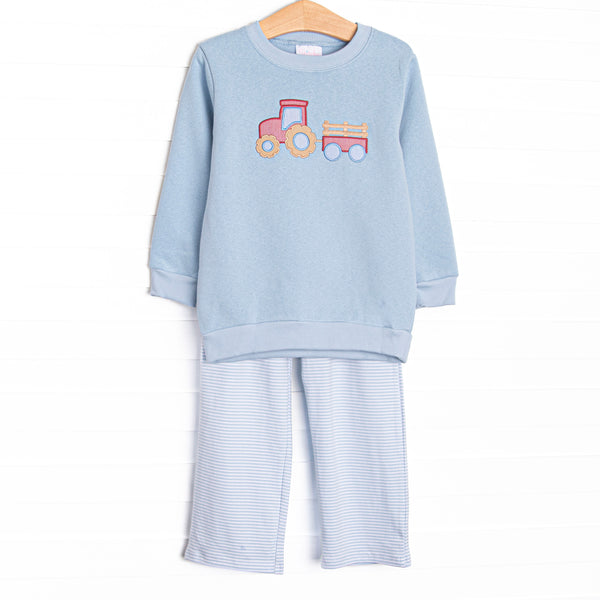  This set features blue knit fabric, tractor applique, and long sleeves. Coordinating blue pants to match. 