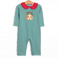 This romper features a green striped print, a red peter pan collar, and a festive puppy applique.