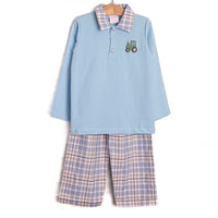 This set features blue knit fabric, tractor embroidery, and a plaid square collar. Coordinating plaid pants to match.