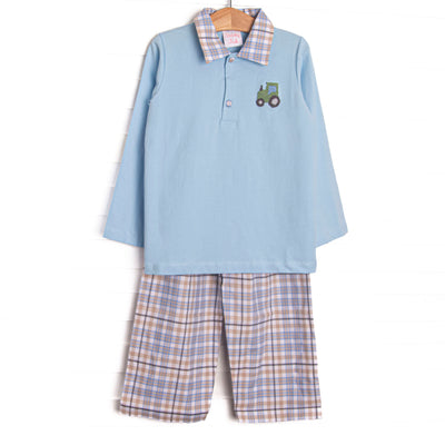 This set features blue knit fabric, tractor embroidery, and a plaid square collar. Coordinating plaid pants to match.