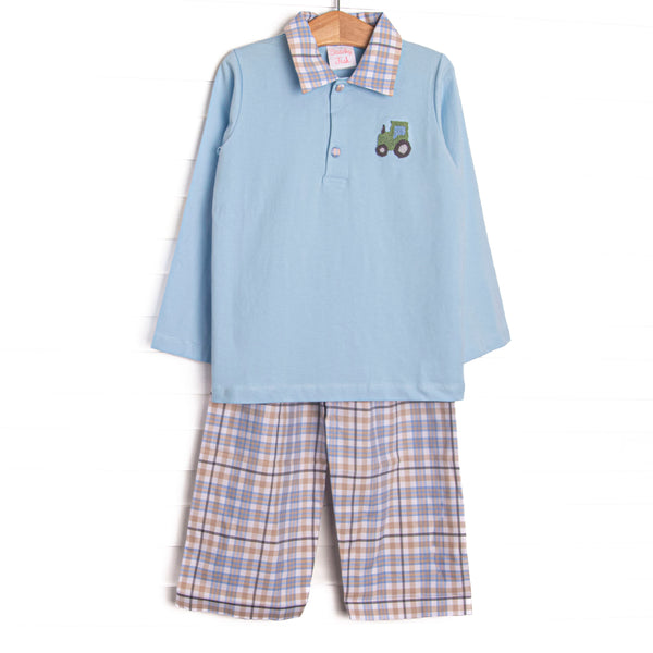 This set features blue knit fabric, tractor embroidery, and a plaid square collar. Coordinating plaid pants to match.