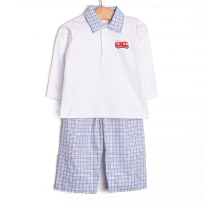 This set features a white top, firetruck embroidery, and a plaid polo collar. Coordinating blue and red plaid pants to match.