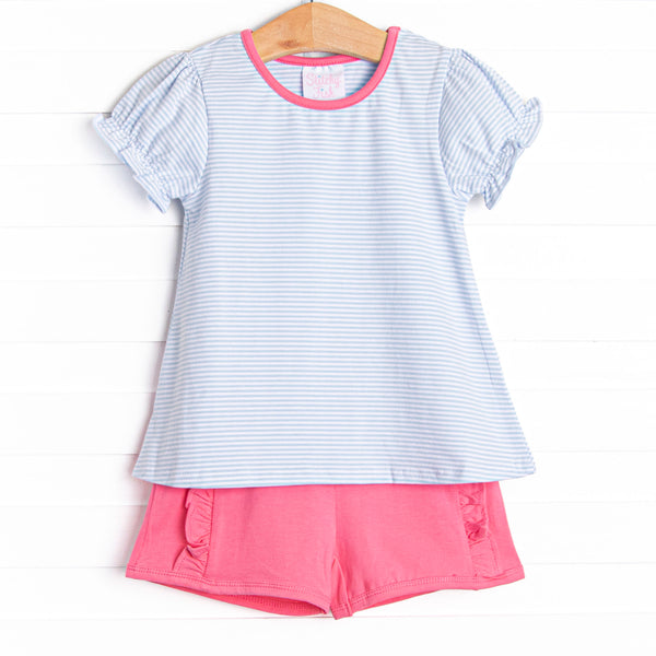 The set features a blue stripe top, pink trim, and pink ruffle shorts to match.