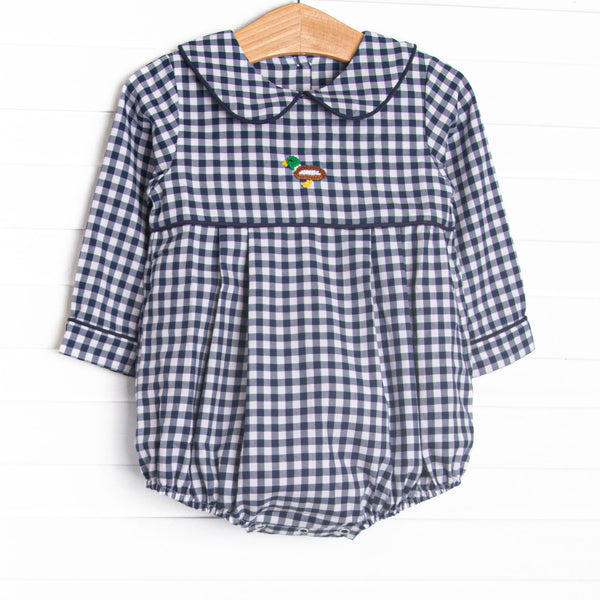 This bubble features navy plaid fabric, duck embroidery, and a Peter Pan collar.