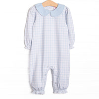 This romper features a blue gingham print, a blue Peter Pan collar, and long sleeves.