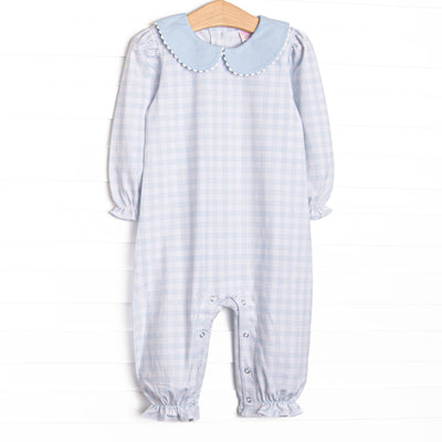 This romper features a blue gingham print, a blue Peter Pan collar, and long sleeves.