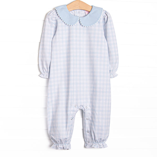 This romper features a blue gingham print, a blue Peter Pan collar, and long sleeves.