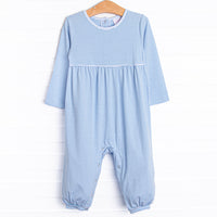 The Romper features long sleeves, snaps in the stride to make changing a breeze, and soft knit material.