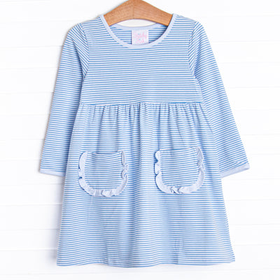 The dress features front ruffle pockets, light blue trim, medium blue&nbsp;stripes.
