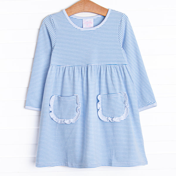 The dress features front ruffle pockets, light blue trim, medium blue&nbsp;stripes.