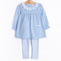 The set features soft knit material, medium blue stripes, and coordinating blue leggings to match