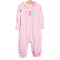 This romper features pink striped fabric, ballerina trio applique, and a ruffle collar.