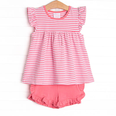 The set features a pink striped flutter sleeve top, the softest knit material, and pink ruffle shorts to match.