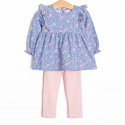  This set features a purple floral print, flutter details, and pink leggings to match. 