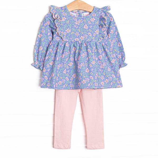  This set features a purple floral print, flutter details, and pink leggings to match. 
