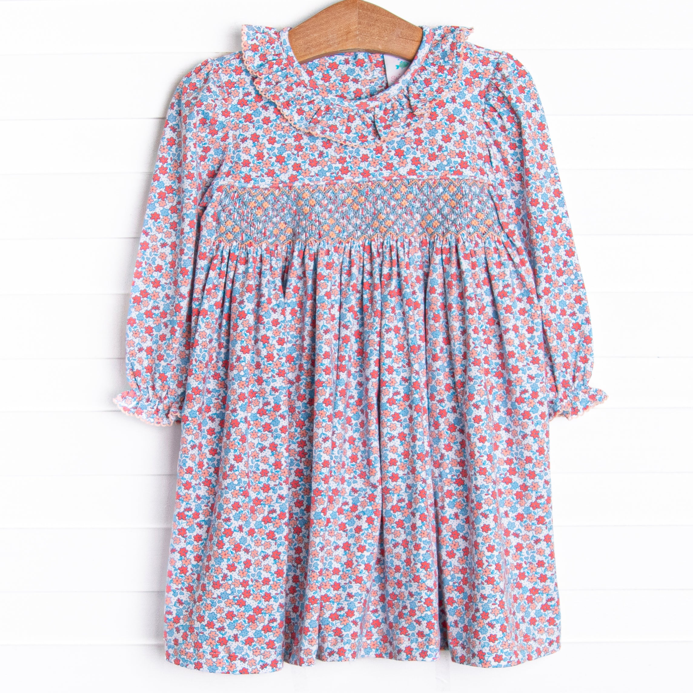 Girl's Peach Petals Smocked Dress in Pink size 12M | Stitchy Fish Girl's Peach Petals Smocked Dress in Pink size 12M | Stitchy Fish
