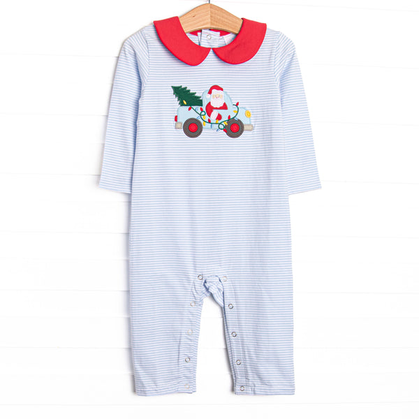This romper features a blue striped print, a red peter pan collar, and a santa truck applique.