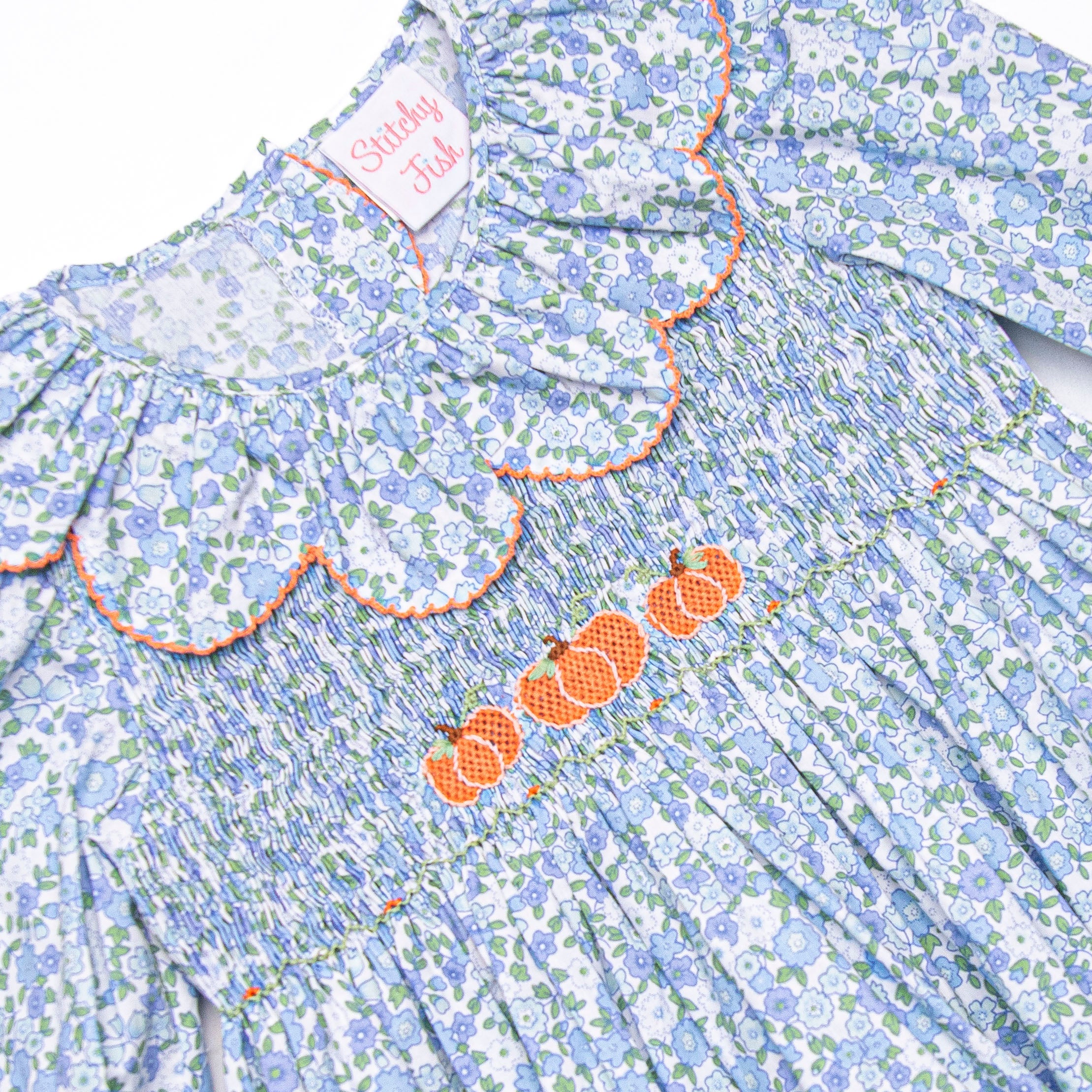 Girl's Pumpkin Posy Smocked Dress in Blue size 6